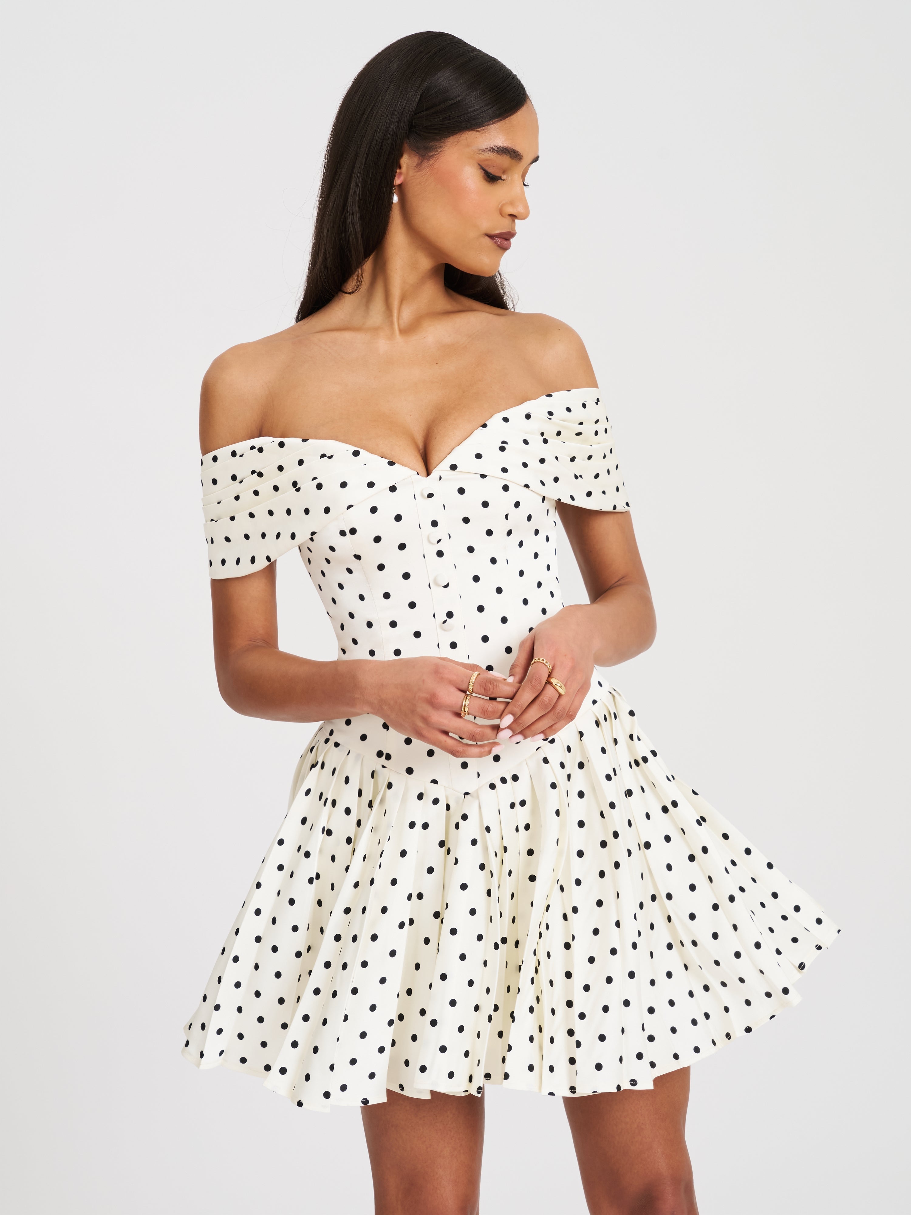 Edeline Polka Dot Off-shoulder Pleated Mini Dress black white