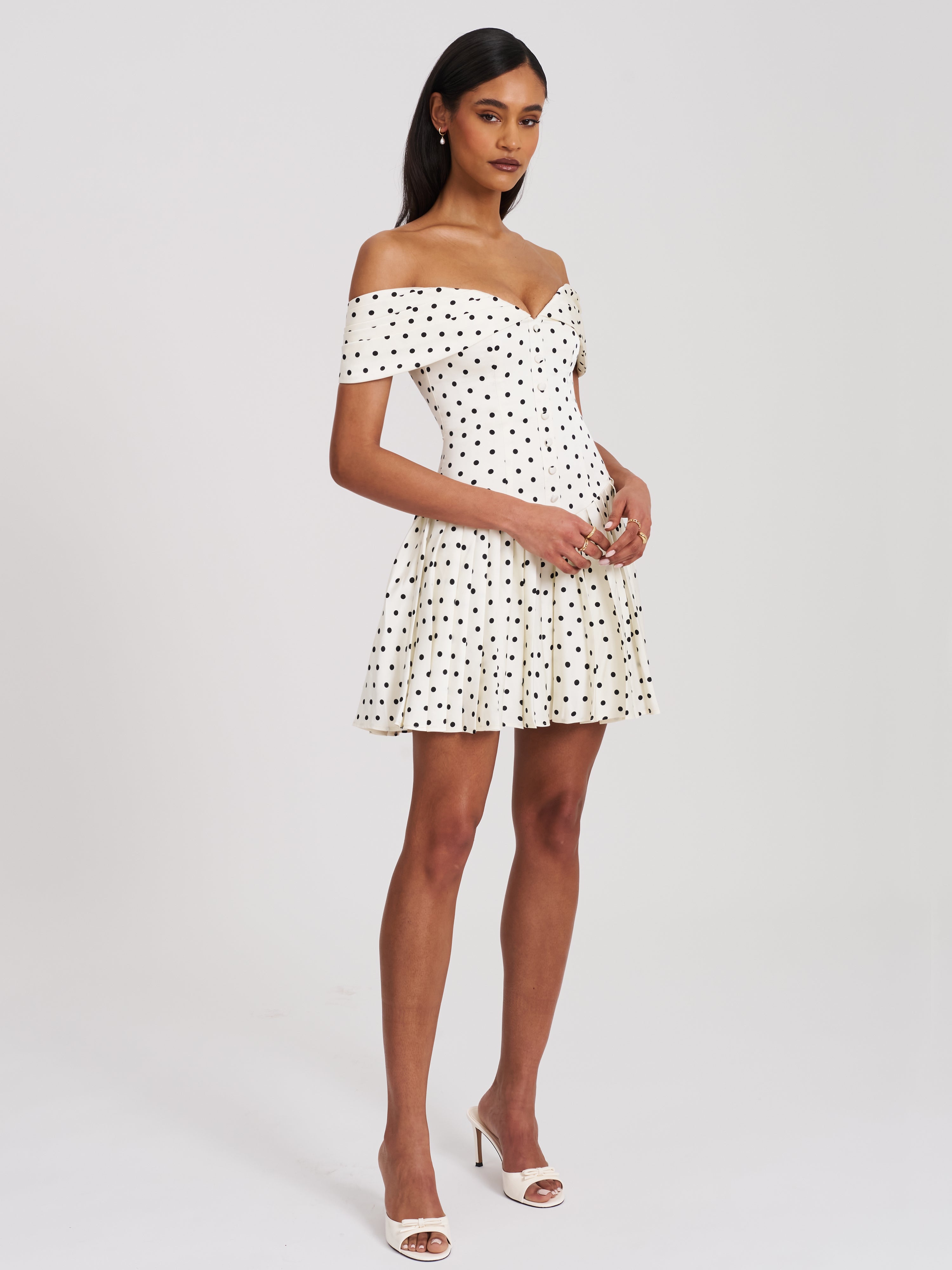 Edeline Polka Dot Off-shoulder Pleated Mini Dress black white