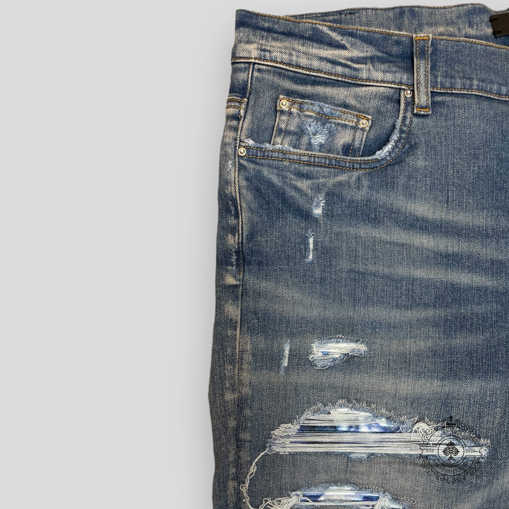 Amiri Tie Dye Bandana Thrasher Jeans in Clay Indigo men's unisex