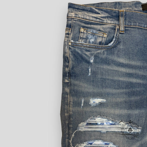 Amiri Tie Dye Bandana Thrasher Jeans in Clay Indigo men's unisex