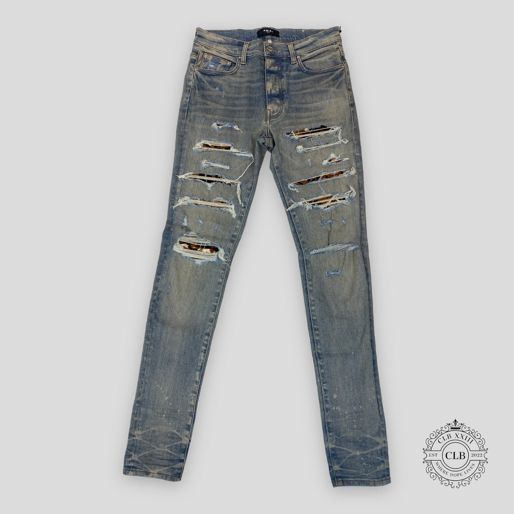 Amiri Lunar New Year Thrasher Blue Jeans in Clay Indigo denim men's designer